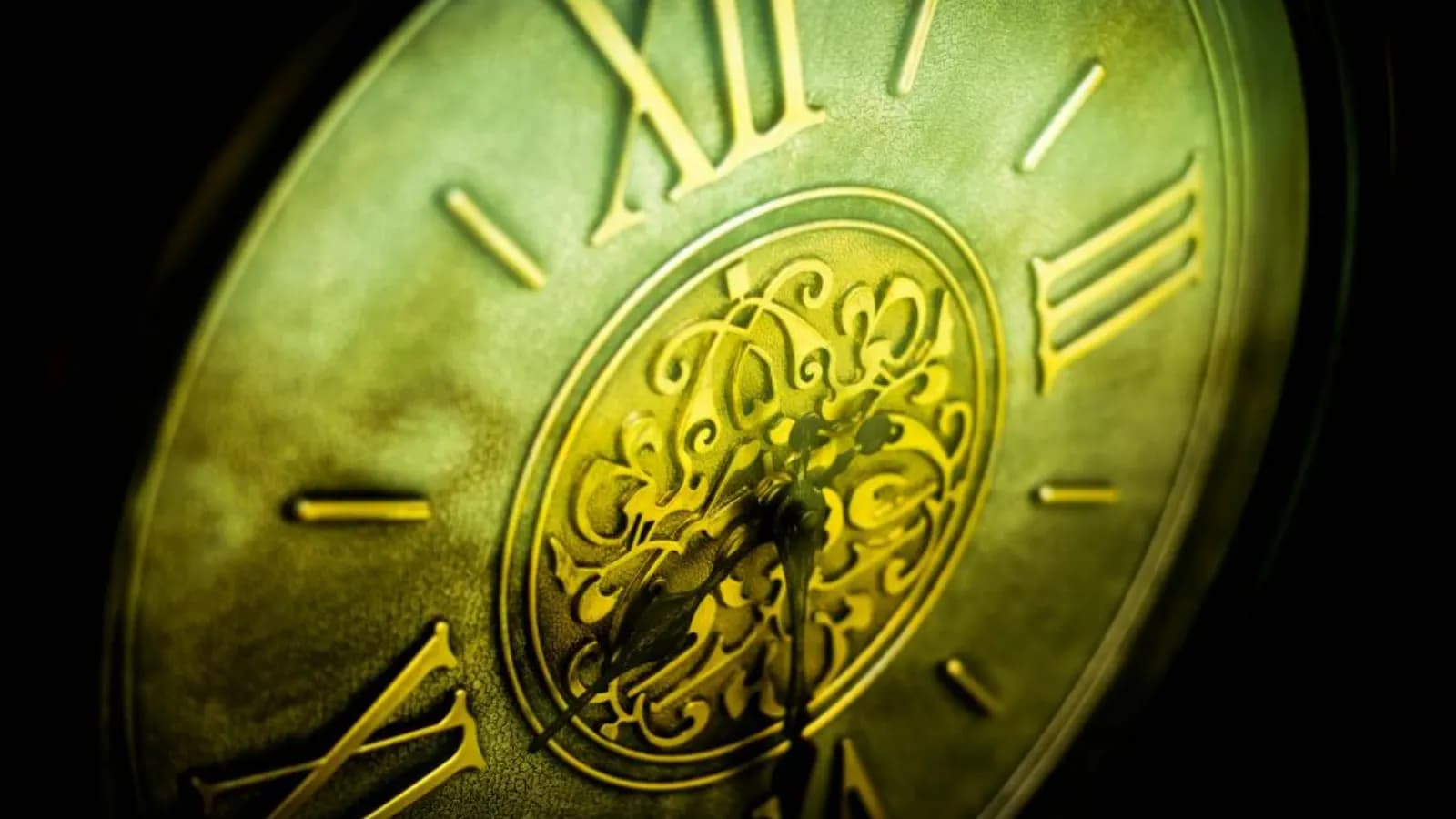 Close-up of an old brass clock face with Roman numerals, a reminder of how fast a fresh lead goes cold